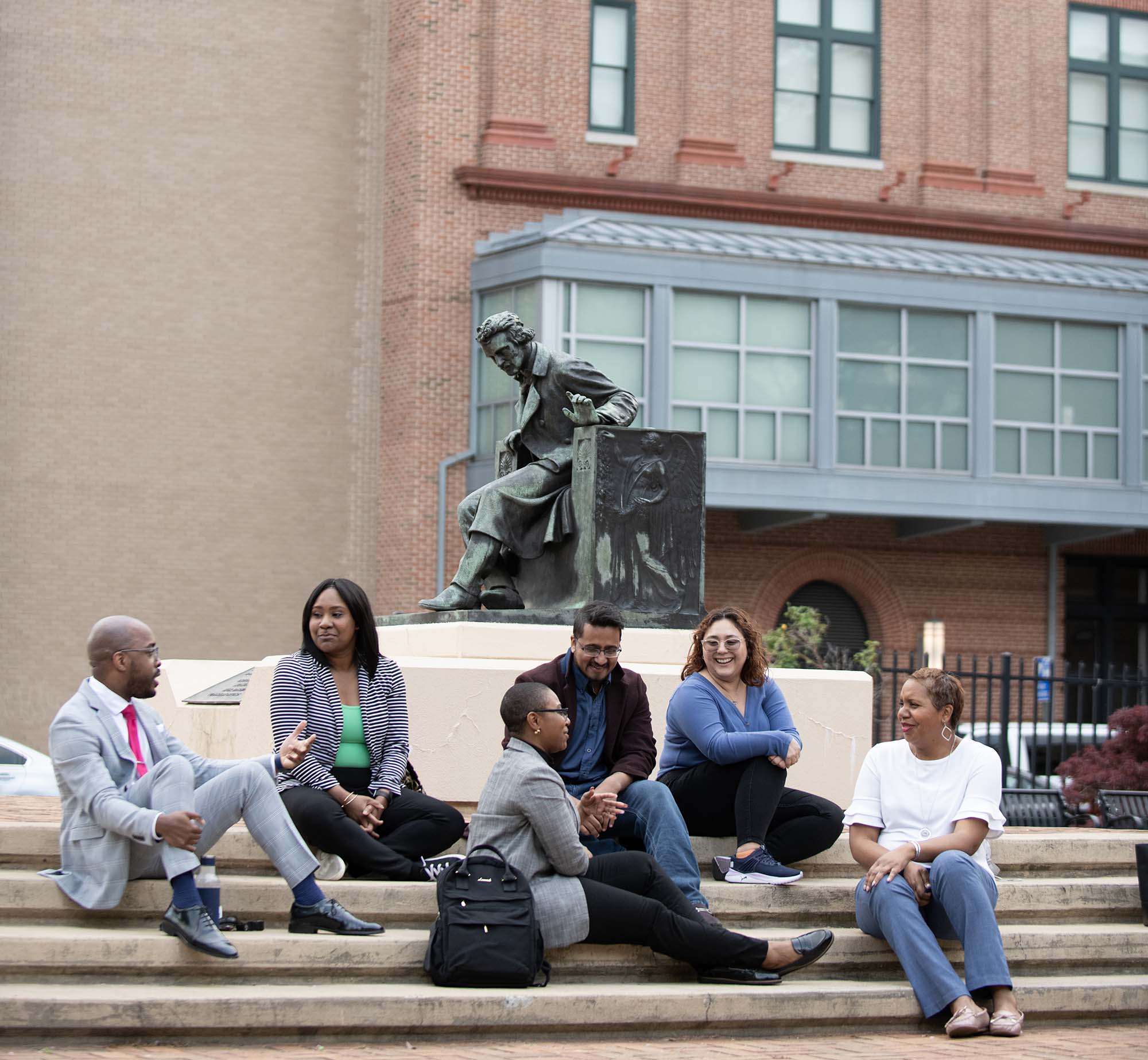People sitting in Gordon Plaza